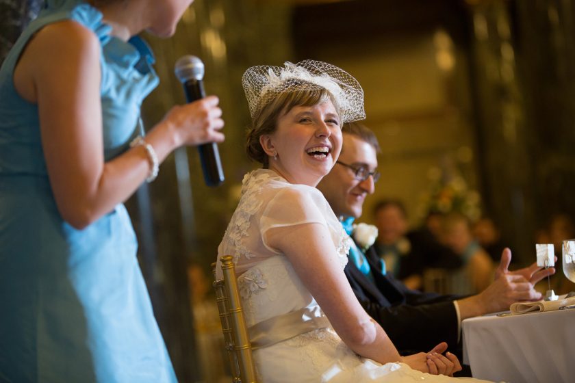 Christina Montemurro Wedding Portfolio - bride laughing during speeches