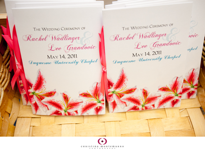 Wedding details Stargazer lilies and printed materials