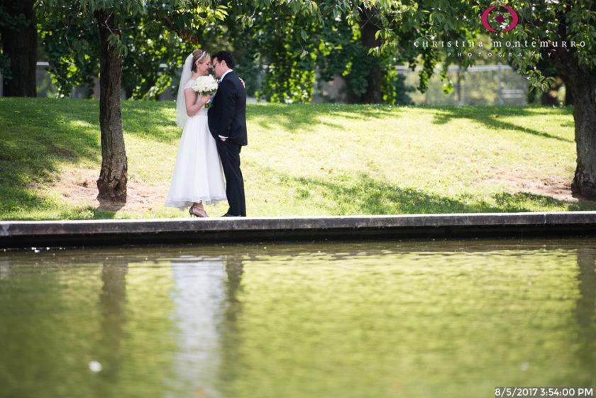 Bride and Groom by the little lake in Allegheny Commons West Park