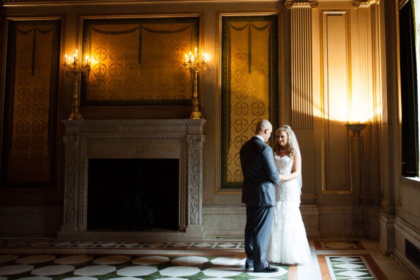 Wedding Photographer captures bride and groom in ball room