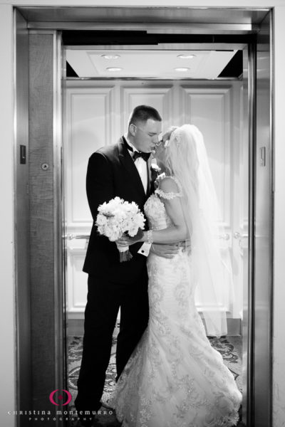 Bride and Groom Kiss in the Elevator Omni William Penn Urban Room Wedding Photography Pittsburgh Wedding Photographer