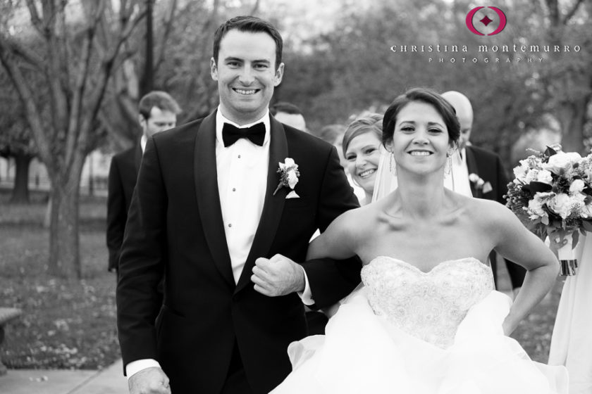 Black and White Photo of Bride and Groom Walking at University of Pittsburgh