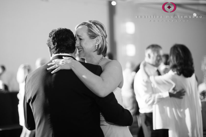 Happy bride and groom dancing at their wedding reception at the Heinz History Center Mueller Center