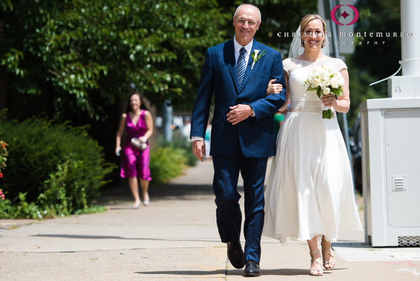 Bride and her father walking into the church for her wedding atSaint Peter Parish Pittsburgh