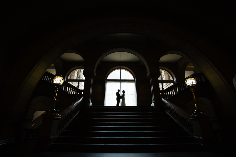 Bride and Groom Silhouette in front of the Windows in the Courthouse in Pittsburgh