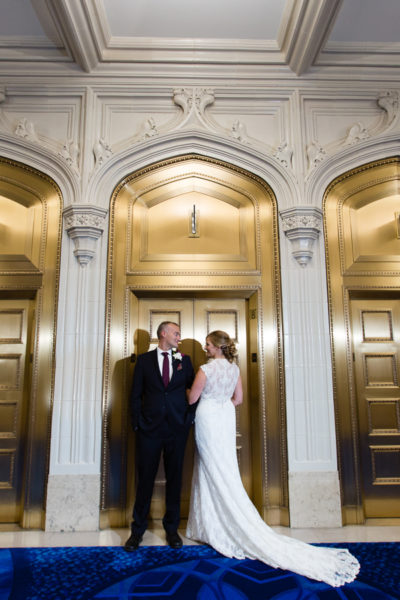 Bride and Groom in front of Gold Elevators in the Pittsburgh Union Trust Building