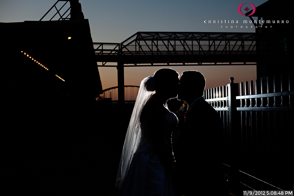 Bride and Groom Kissing at Twilight in Station Square