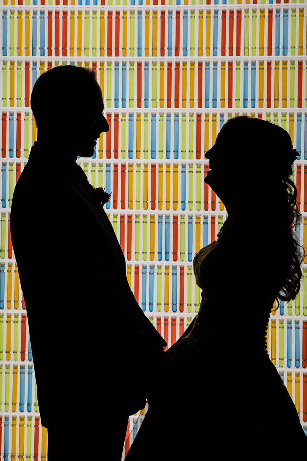 Laughing Bride and Groom Silhouette in front of Lights at Heinz History Center