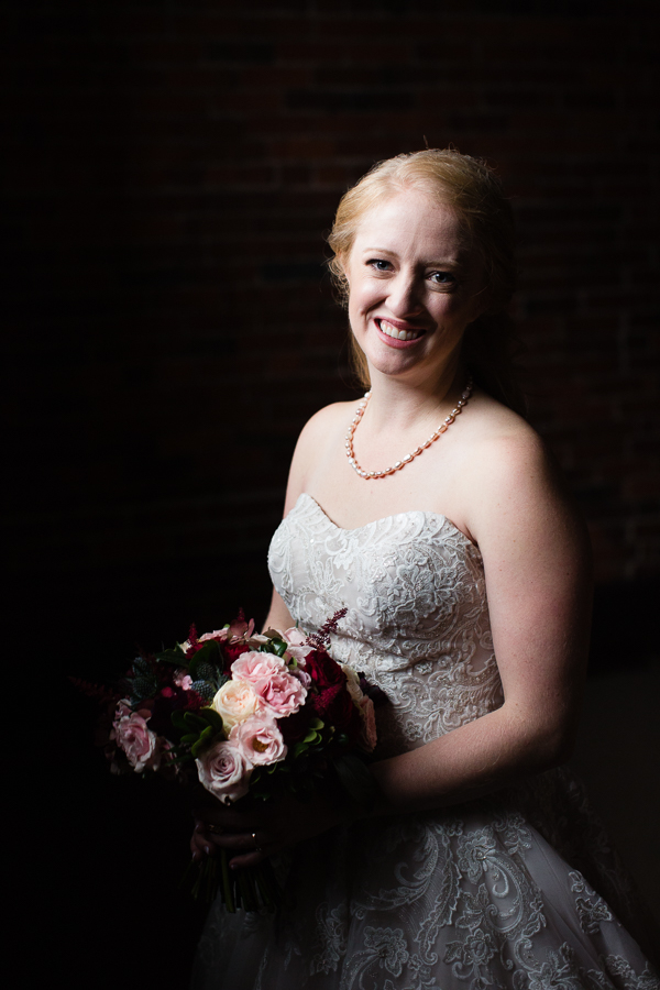 Classic Portrait of Beautiful Bride in Strapless Dress with Bouquet by Blue Daisy Floral Designs