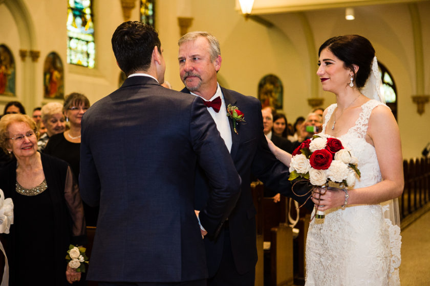 Father of the Bride Shakes Hands with Groom Before the Wedding Ceremony