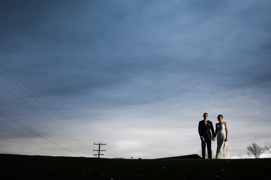 Bride and Groom Portrait with Dramatic Sky at Lenape Heights Golf Resort