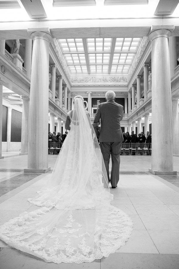 Beautiful photo of Bride and her father about to walk into wedding ceremony at the Hall of Sculpture Carnegie Museum