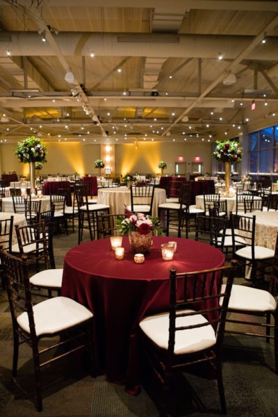 Mueller Center 5th Floor Heinz History Center with Brown Chiavari Chairs, Burgundy and Champagne Linens, Tall and Low Centerpieces by Blue Daisy Floral Deisgns