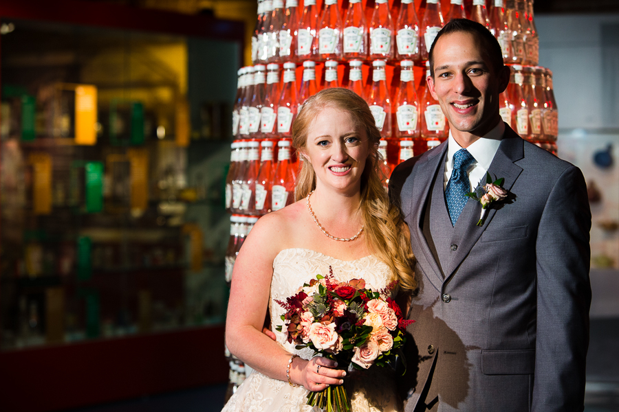 Bride and Groom in front of Heinz Ketchup Bottle Display at Heinz History Center