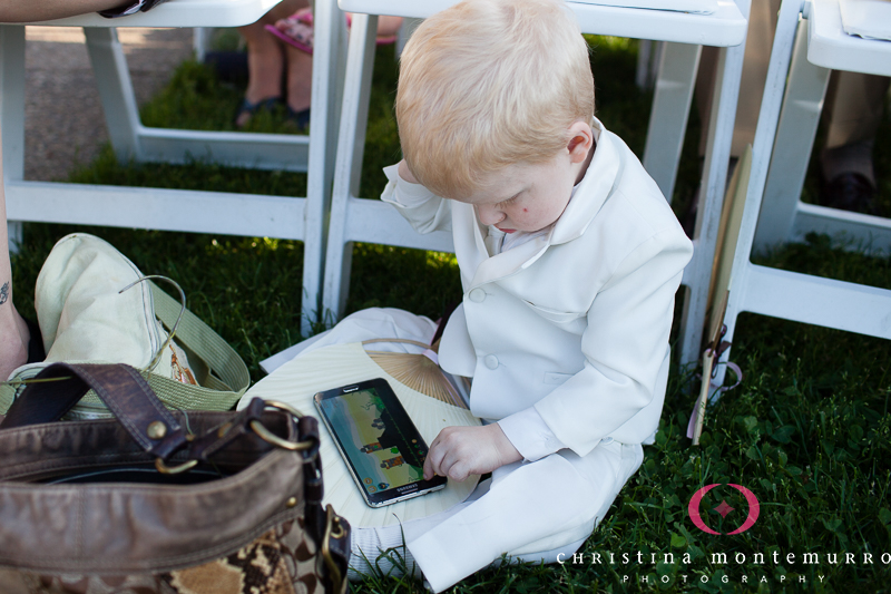 Ring Bearer Plays a Video Game at Phipps Outdoor Wedding