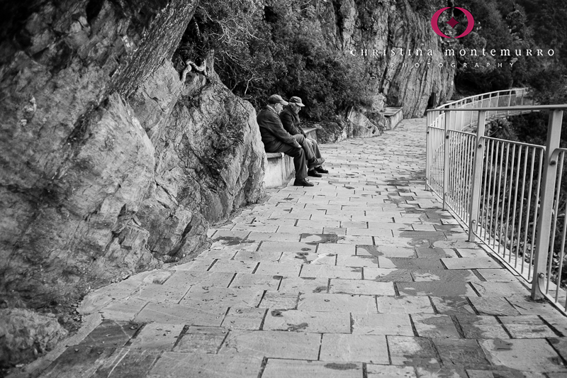 Men taking a break on Via Dell'Amore, Riomaggiore, Italy