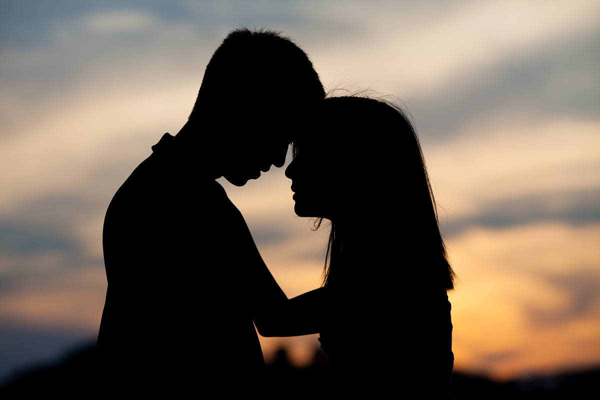 Christina Montemurro Engagement Portfolio - engaged couple silhouette at sunset