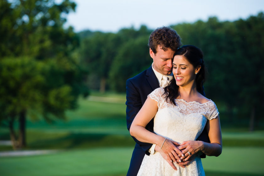 Bride and Groom at Sunset on Golf course