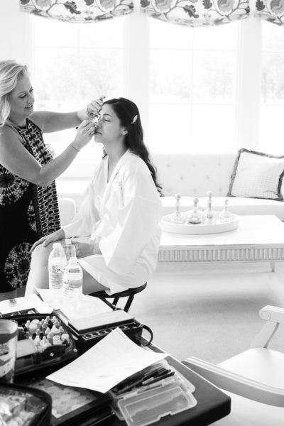 Joy Lager of JL Makeup Studio applies bridal makeup