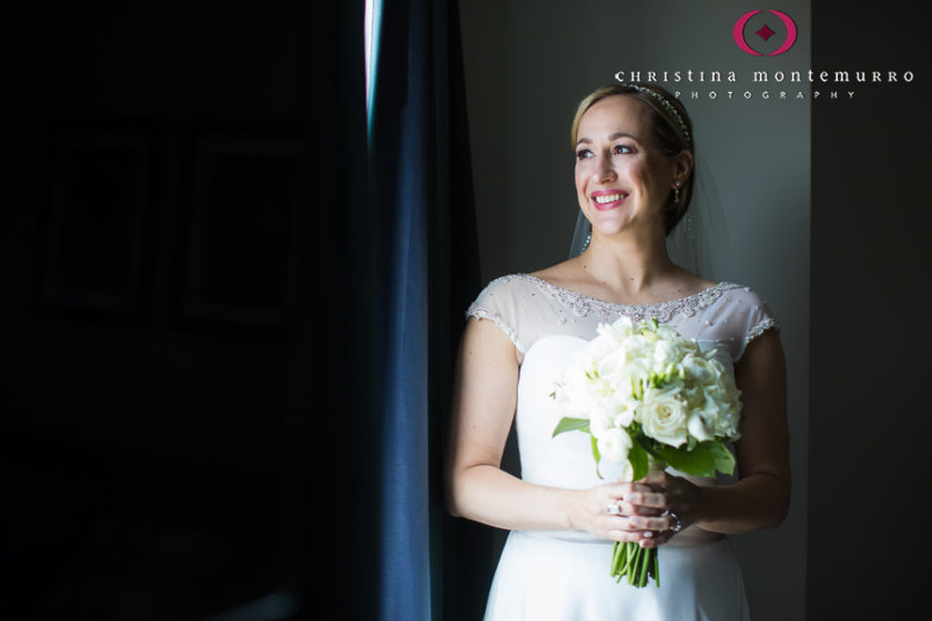 Happy bride with white bouquet before her wedding at Homewood Suites Pittsburgh Wedding_-6