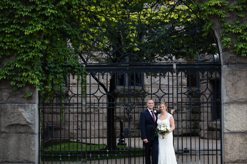 Bride and Groom in front of Ivy Covered Gate at the Allegheny County Courthouse