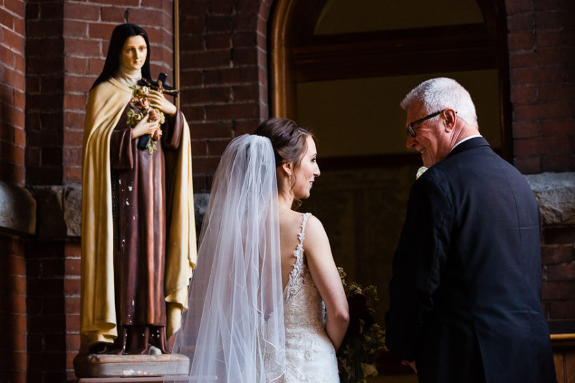Bride and her dad right before her wedding at St. Joseph Chapel