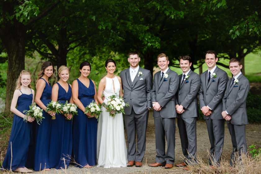 Bridal Party with Dark Blue Dresses and Gray Suits