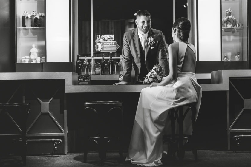 Bride and groom portrait in prohibition speakeasy exhibit at the Heinz History Center