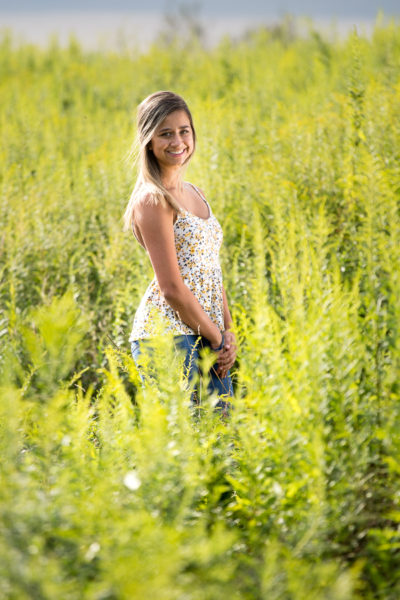 Pittsburgh Senior Photography in Open Green Field inNorth Park