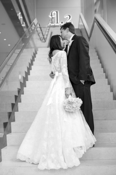 Bride and groom on Fairmont Hotel staircase
