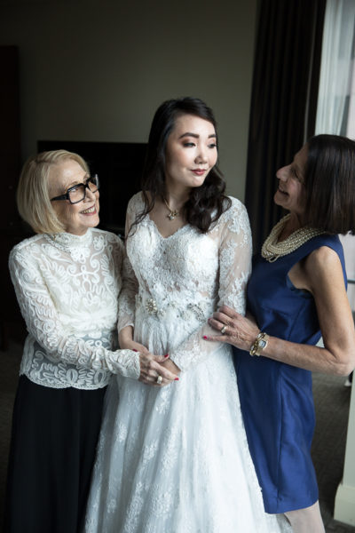 Bride with her mother and grandmother before her wedding