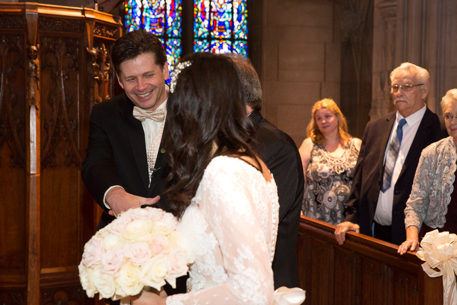 Groom greets his bride at Heinz Chapel