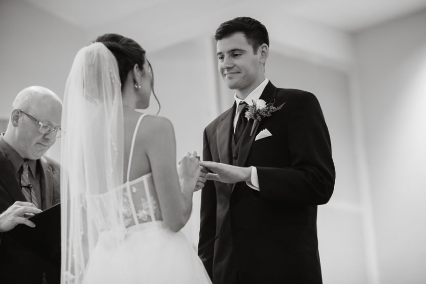 Bride and Groom Exchanging Rings at Wedding Ceremony