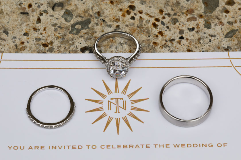 Wedding rings and custom invitation
