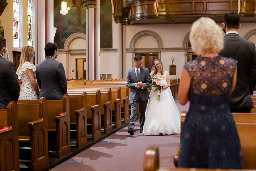 Bride waslking down the aisle at St. Augustine Church